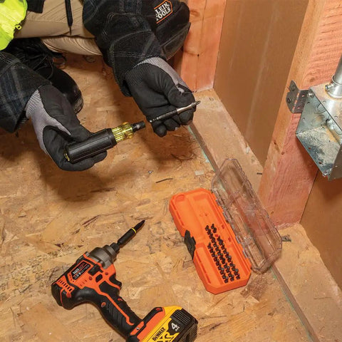 Impact Rated 46 Piece Multi Bit Screwdriver And Nut Driver Set With MODbox Case, 39 Bits, 4 Nut Drivers in use on job site floor