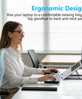 Woman using Game Changing Adjustable Laptop Stand With Ergonomic Elevation For A Comfortable Desk Setup at office desk