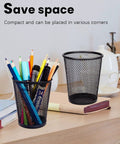 Black Mesh Pencil Holder Metal Pen Cup Desk Organizer Set Of 6 For Office, School, And Home on a desk with supplies