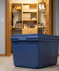 Built Tough 18 Gallon Storage Bins 2 Pack Stackable Heavy Plastic Containers in a closet, blue with secure snap lids.
