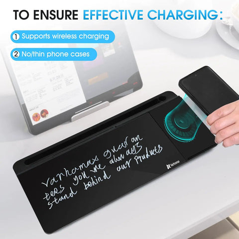 Glass Desk Whiteboard With Wireless Charger Stand displaying phone charging and handwritten notes.