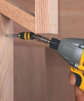 Pivoting Impact Driver Bit Tip Holder With Ring, One Quarter Inch Shank Fits Any Chuck Or Impact Driver, Delivers Up To Two Thousand Inch Pounds Of Torque For Tightening Loosening And Drilling, Durable Steel Construction, being used to drill into wood