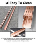 DIY Friendly Customizable Stainless Steel Linear Drain System For Driveways Pools And Lawns Slender Trench Drain 2x2 Inch Channel Gutter Solution With Flexible 90 Degree Corners T Shaped Configurations Four Way Joints And End Plug in rose gold, highlighting easy-to-clean feature and gutter detail.
