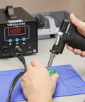 Efficient Desoldering Station With 80W Power, Auto Shutoff, and Precise Temperature Control in use on a circuit board