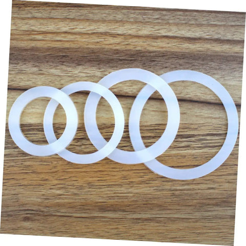 5 Pack Silicone Sealing Rings Replacement Gaskets For Coffee Pot Lids Espresso Pots And Canning Jars displayed on wooden surface