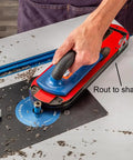 Person using a routing table with wood, showing Phenolic Zero Clearance Table Saw Insert Blanks 2 Pack For Reduced Splintering