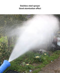 Heavy Duty High Pressure Garden Sprayer With Adjustable Nozzle spraying fine mist in a garden setting, showing atomization effect