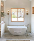 Dope Mid Century Smoke Glass Plug In Wall Lights Two Piece Brushed Brass Globe Sconce Lamps in modern bathroom setup