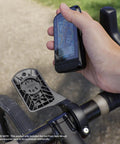 Cyclist holding GPS above Out Front Mount For Wahoo ELEMNT ROAM And Bolt 3 GPS Cycling Computer With Aerodynamic Front Bracket