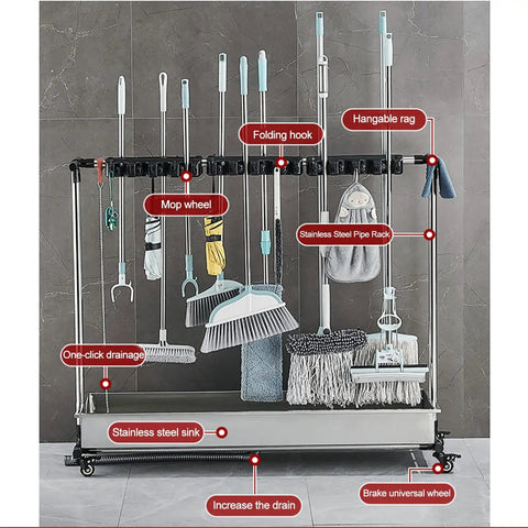Mop And Broom Holder Heavy Duty Stainless Steel Tool Rack with Movable Organizer Storage, holding various cleaning tools.