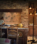 Living room with Retro Edison LED Bulb 4W 450 Lumens 2700K warm white in a vintage floor lamp illuminating rustic decor.