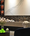 Room with dark colorful peel and stick backsplash tiles, flowering vase, and decor. Peel And Stick Backsplash Tiles For Kitchen And Bathroom
