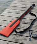 Pro Grade Paddle Bag For Boats With Quick Rapid Evaporation Tech Keeps Paddles Dry on wooden dock with stopwatch and whistle