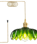 Super Easy Install Green Glass Plug In Pendant Light Giving Your Place That Killer Modern Vibe While Skipping Costly Electrician Fees For Simple Plug Cable Hanging Light Setup For Living Rooms And Bedrooms Today - Dark green glass pendant lamp with adjustable cord.