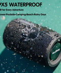 Compact Waterproof Portable Bluetooth Speaker That Goes Hard With Deep Bass, Dual Pairing, FM Radio, USB And AUX Input, 24 Hour Playtime with water droplets