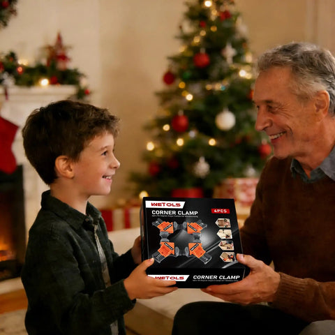 Boy giving man a box of Four Pack 90 Degree Corner Clamp Set for Woodworking, Spring Loaded Right Angle Clamps by Christmas tree.