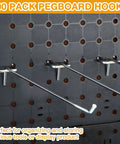 100 Pack Stainless Steel Pegboard Hooks For One Eighth And One Quarter Inch Pegboards installed on black board