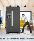 Man using heavy duty furniture lifters on a modern fridge; 5-piece set for smooth moving; ideal for washers too.