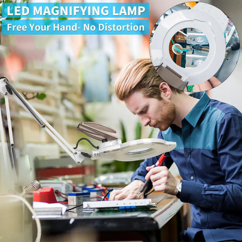 Man using Lit 2200L LED Magnifying Lamp With Stand Real Glass Lens Dimmable Light for electronics repair in workshop