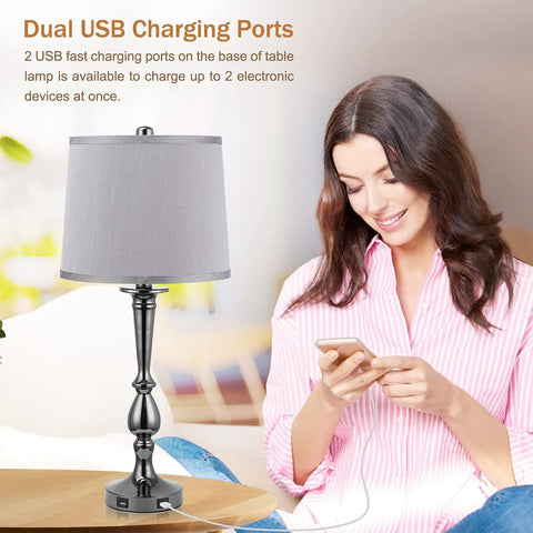 Woman charging phone with Industrial USB Table Lamp Set Of 2 With Dope Dual USB Charging Ports, Gray Bedside Lamps, 25.9" tall