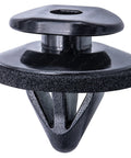 Close-up of black plastic fender trim retainer with sealer