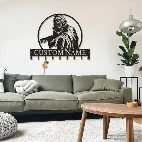Living room view with Personalized Badass Grim Reaper Key Holder with Custom Name, metal skull wall-mounted key rack.