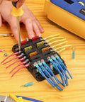 Insulated 1/4 inch heat-shrink ring terminals in a multiport terminal block; color-coded red, yellow, blue