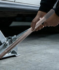 Replacement Floor Jack Handle For Hydraulic And Bottle Jacks, Heavy Duty Steel And Plastic Lever being used in garage