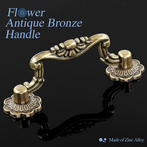 Antique Bronze Cabinet Pulls Set Of 10 With 3 Inch Hole Centers with floral design on a black background