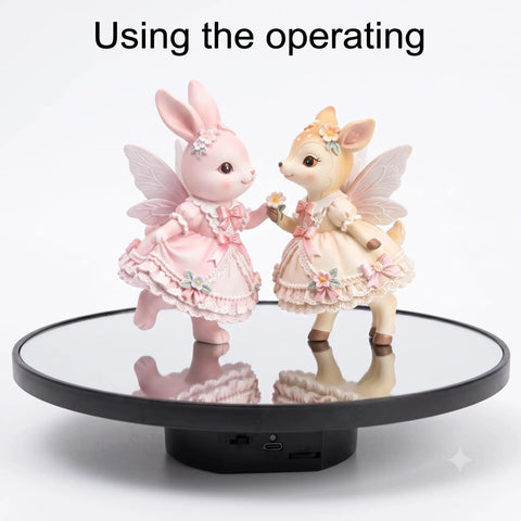 JAYEGT Motorized Rotating Display Stand, 10-Inch Mirror Finish Turntable showcasing figurines on a sleek black base.