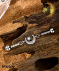 Dope Industrial Piercing Jewelry 316L Surgical Steel Barbell With Clear CZ Moon Dangle on wood, 38mm, 14G, sleek design.