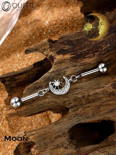 Dope Industrial Piercing Jewelry 316L Surgical Steel Barbell With Clear CZ Moon Dangle on wood, 38mm, 14G, sleek design.
