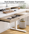 Sit Stand Desk With Drawers And Shelves 47 By 23.6 Inch Electric Height Adjustable Standing Desk With Storage Memory Presets 28 To 46 Inch Range White Finish For Computer Workstation And Home Office showing open dual drawers