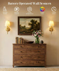 Battery Powered Wall Sconces Set Of Two with remote control, featuring warm light and elegant design enhancing a cozy interior.