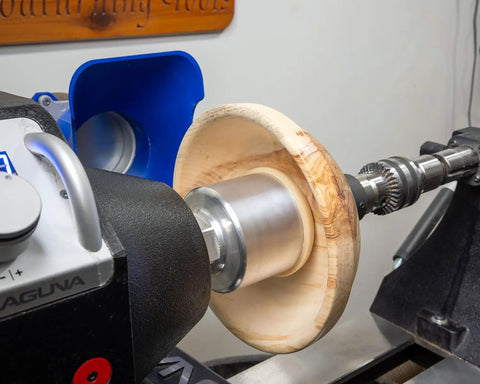 American Made Vacuum Chuck for Woodturning Lathe Bowls, 1 1/4 Inch 8 TPI, 3 1/2 Inch Outside Diameter, attached to lathe holding bowl