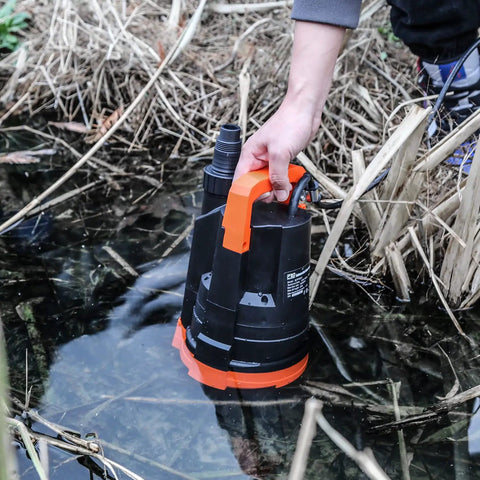All Purpose Submersible Water Pump 1HP 3430 GPH Portable Drainage for Pools Ponds Gardens Basements and Flooded Cellars Easy Start Heavy Duty Home Use being submerged in water.