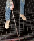 Worker using Ergonomic Round Connecting Bar 7/8 Inch Wide By 30 Inch Long With 15 Degree Angled Chisel, Tapered End