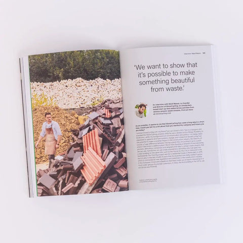 Open book with a page showing an article on waste recycling with Sustainable Materials For Product Design A Practical No Nonsense Guide.