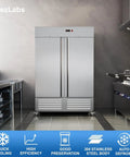 Heavy Duty Two Door Upright Commercial Freezer In Stainless Steel featuring adjustable shelves in a professional kitchen.