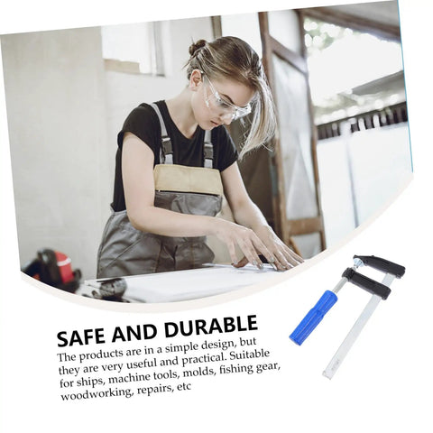 Woman woodworking with focus on Four Pack Woodworking Clamps Durable Spring Fixing Tools With Beefy Grip for DIY projects.