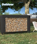 4 Foot Firewood Rack Holder With Cover in garden, full of stacked logs, black metal frame, suitable for outdoor use.