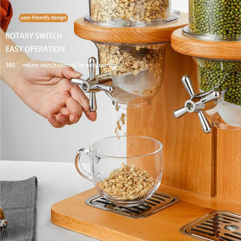 Rock Solid Three Barrel Grain Dispenser For The Kitchen Counter With Smooth Pour Valves And Sturdy Sapelli Wood Base Holds 12 Liters Of Coffee Beans Or Snacks A Total Game Changer For Mess Free Pantry Storage with oats dispensing into a glass cup.