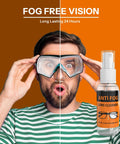 Front view of a man wearing diving goggles with an anti-fog lens cleaner spray bottle beside him.