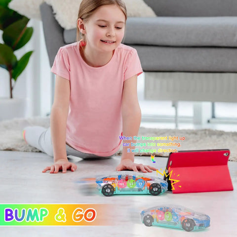 Child playing with a Light Up Transparent Car Toy For Kids That Totally Sparks Sensory Play With Colorful Moving Gears Self Propelled Moving Music And Educational Fun Ideal Birthday Gift Idea For Boys And Girls