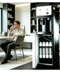 Slick Tankless Water Dispenser Chiller With Four Stage Filtration And Three Custom Temp Settings in modern office setting.