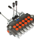Front view of a 6-spool hydraulic directional control valve with multiple lever controls and orange port caps.