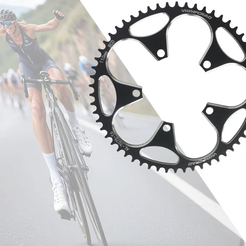 56T Black Narrow Wide Bike Chainring for 8 to 12 Speed Road Bikes, 110 BCD Aluminum, shown with cyclist in background