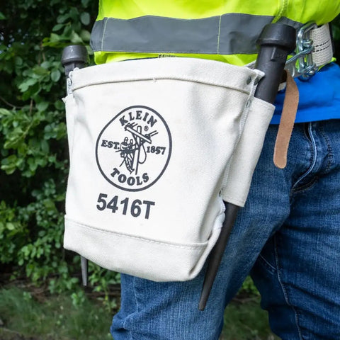 Worker wearing Heavy Duty No 4 Canvas Tool Bag With Bull Pin And Bolt Pouch For Rigs, 5 By 10 By 9 Inch, Belt Connection