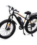 Heavy Duty 26 Inch Fat Tire Electric Mountain Bike For Adults Packed With 48V 720Wh Battery 7 Speed Slick Gears That Tear Up Hills Led Display And Dual Disc Brakes Black side view with large fat tires and battery.