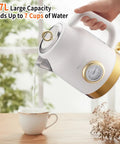 Retro Electric Tea Kettle 1.7L With Temperature Gauge 1500W Fast Boil 304 Stainless Steel BPA Free Auto Shut Off Boil Dry Protection Matte White Gold Kitchen Essential pouring water into cup
